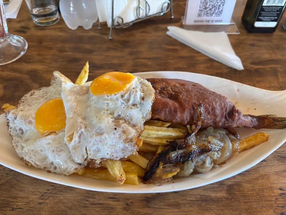 Lomo a lo pobre — plato de Casa de Campo, San Clemente