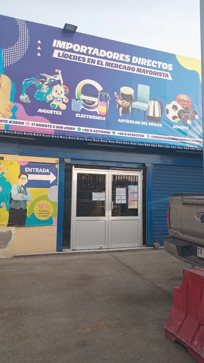 Entrada y letrero de categorías de Comercializadora Oriente Talca