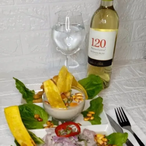 Ceviche de reineta con camote y choclo