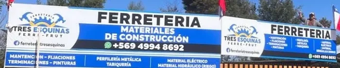 Letrero azul de Ferretería Tres Esquinas: materiales de construcción y teléfono