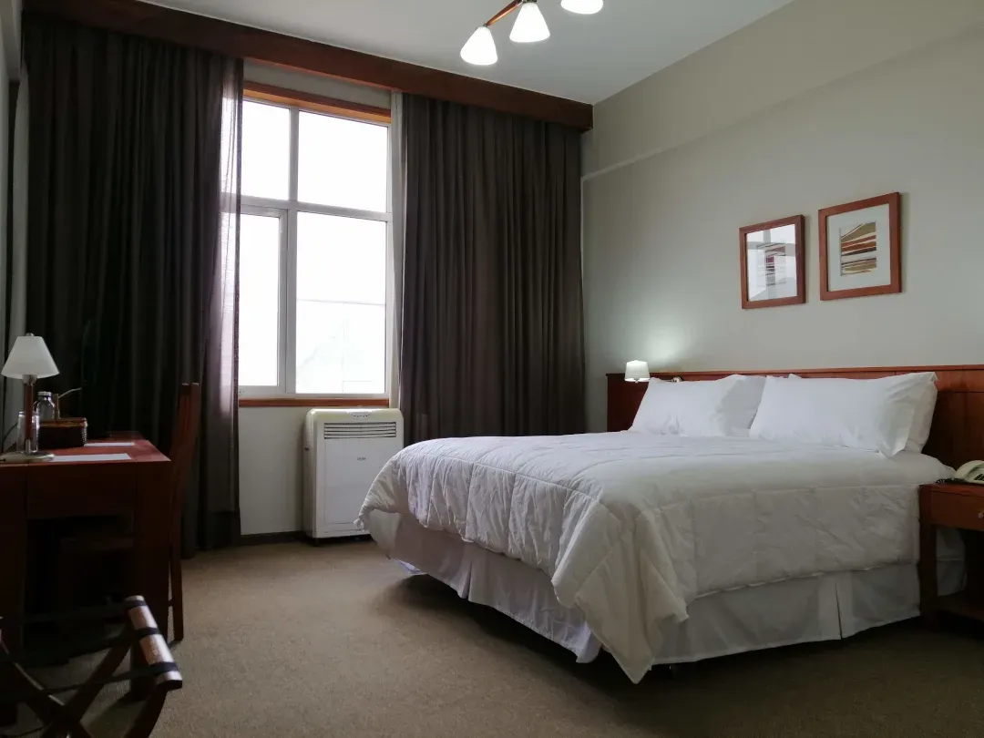 Habitación cuádruple amplia para familias en el Gran Hotel Isabel Riquelme