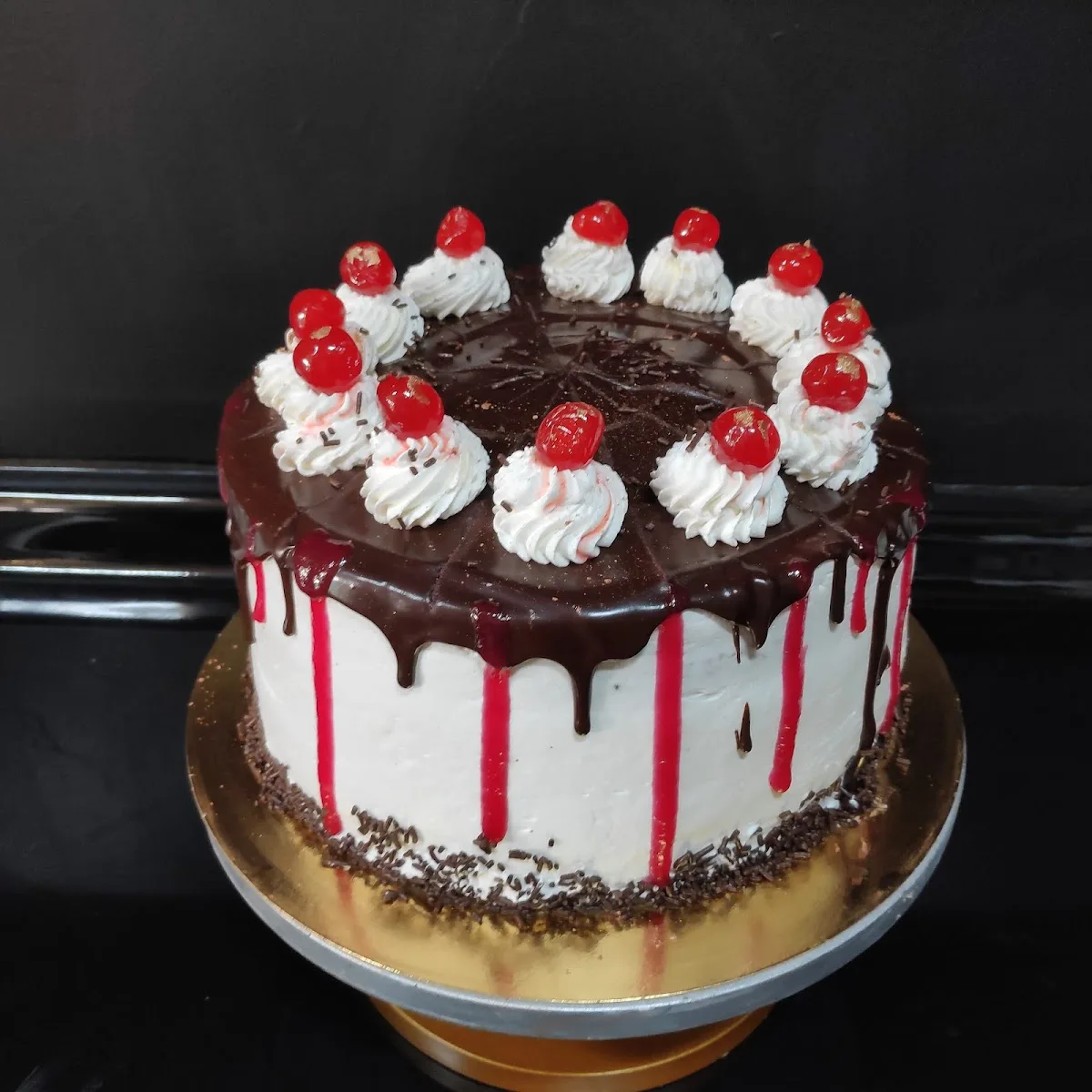 Chocolate y cerezas — pastelería La Orquídea, Talca