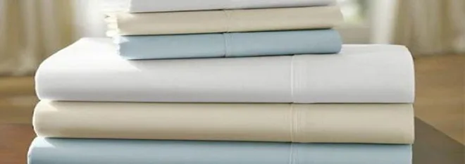 Ropa blanca institucional procesada en la lavandería