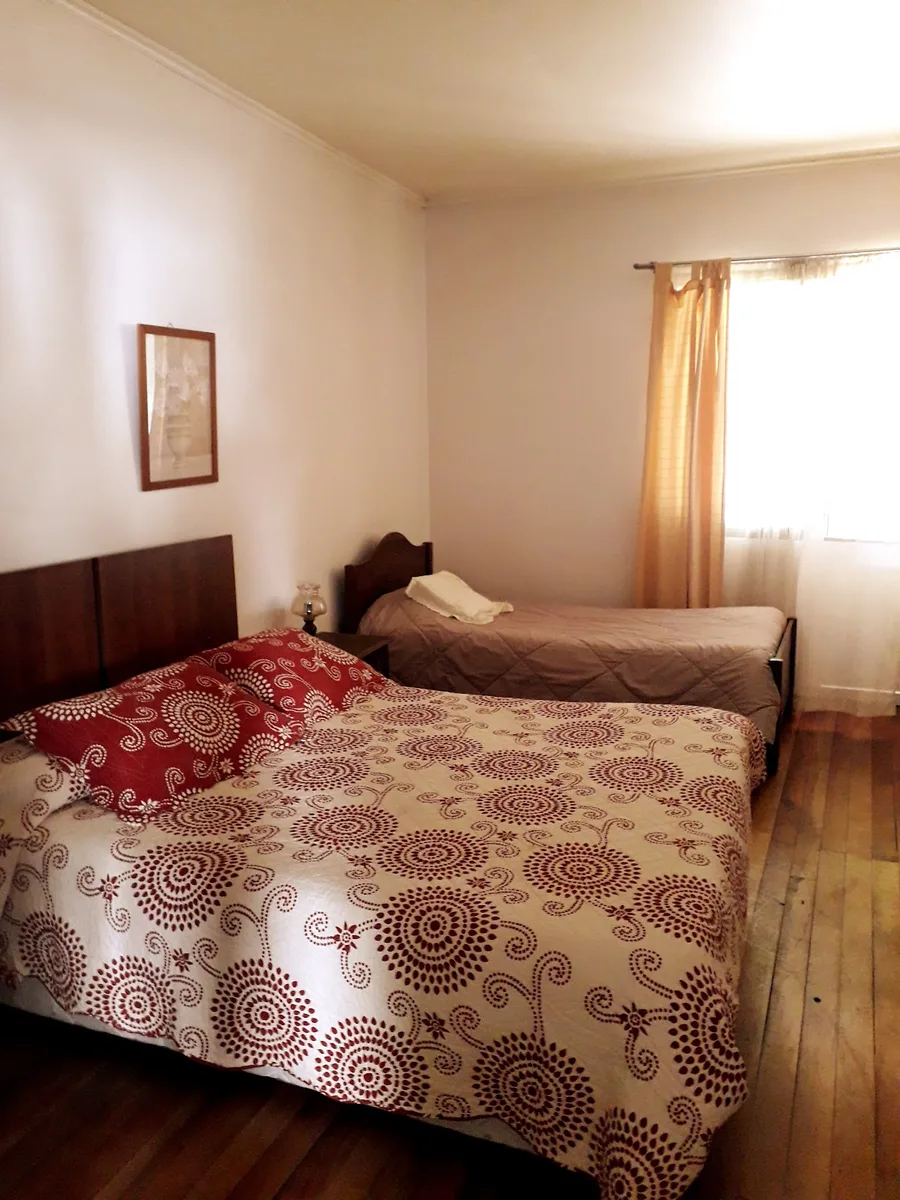 Habitación con camas en Luna Plena Hostal