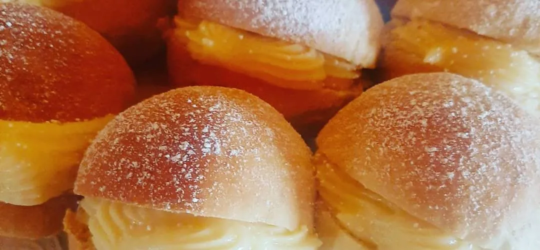 Berlines espolvoreados con azúcar — foto real de Pasteles Maca