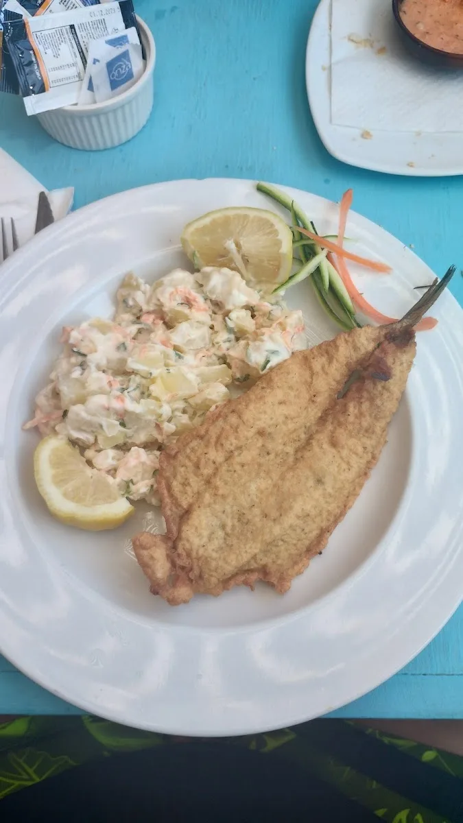 Pescado frito con papas