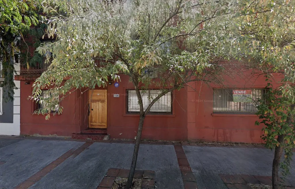 Fachada de la oficina de RTC Ingenieros en 5 Norte 1125, Talca — el número 1125 visible en la puerta