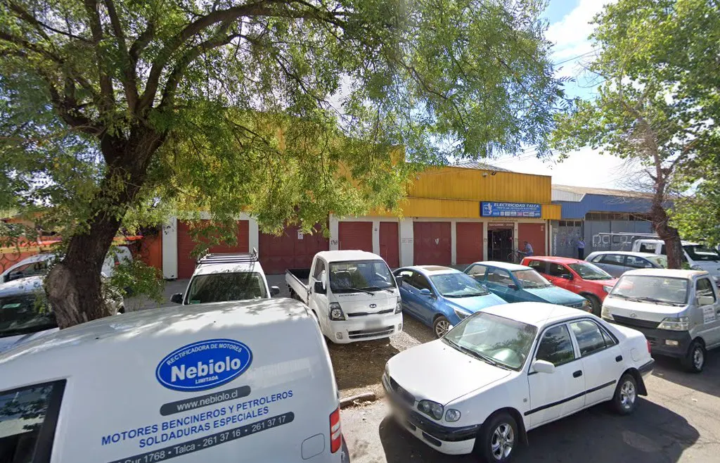 Galpón industrial amarillo de Calle 5 Sur donde trabaja TORNO METAL, Talca